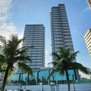 Apt novíssimo pé na areia com vista para o mar